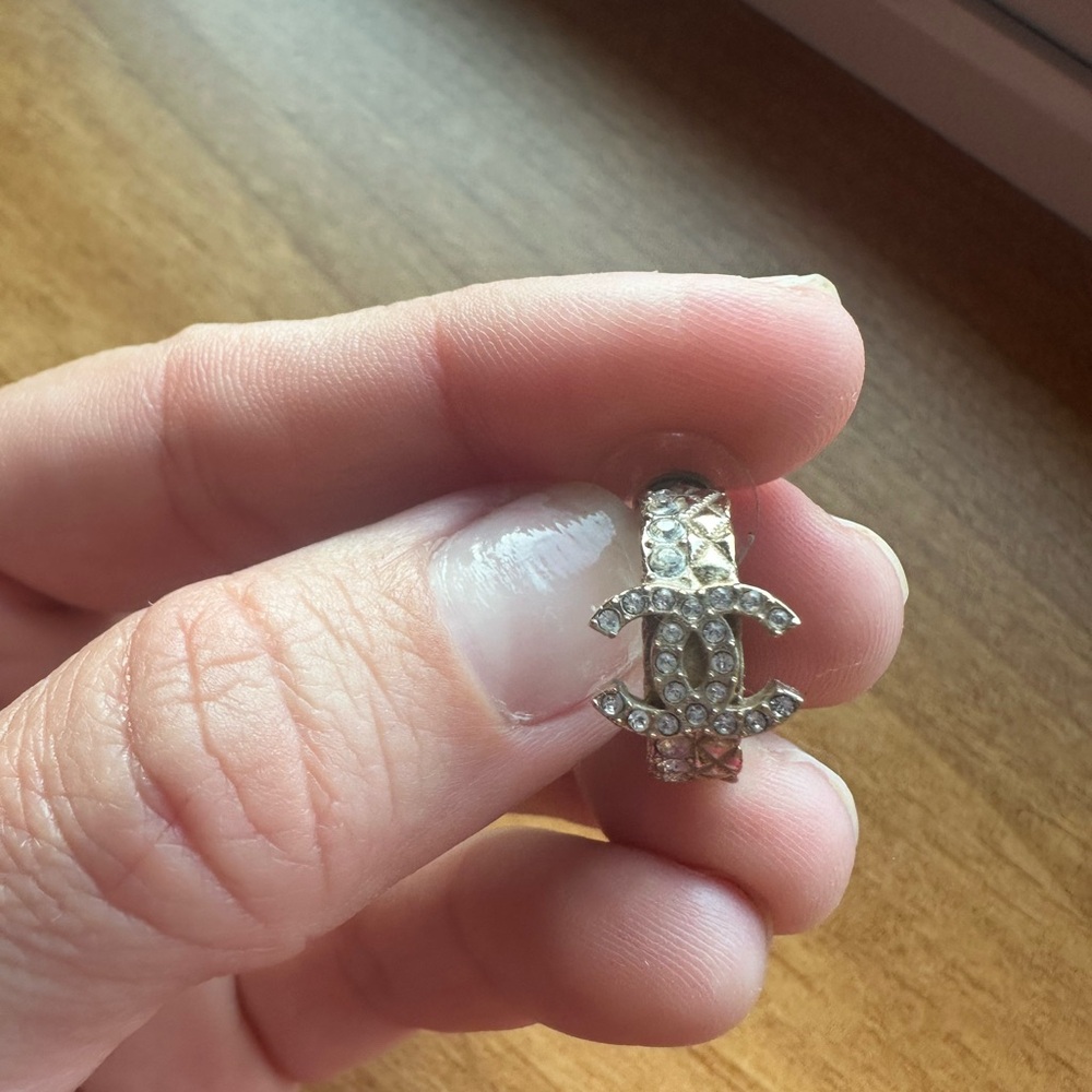 Authentic CHANEL Silver Crystal Logo earring